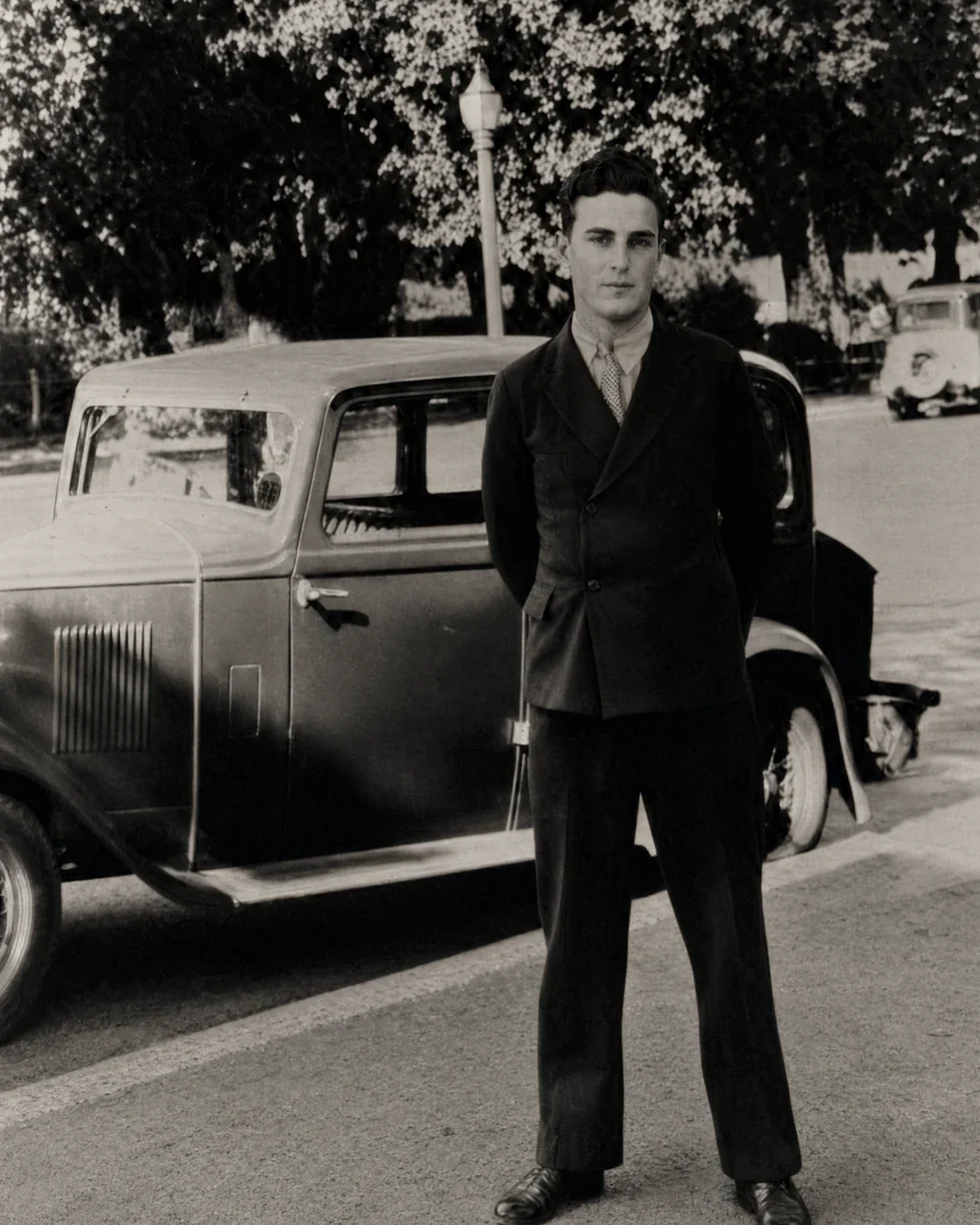 Repaired black-and-white photograph — creases, tears, and stains removed
